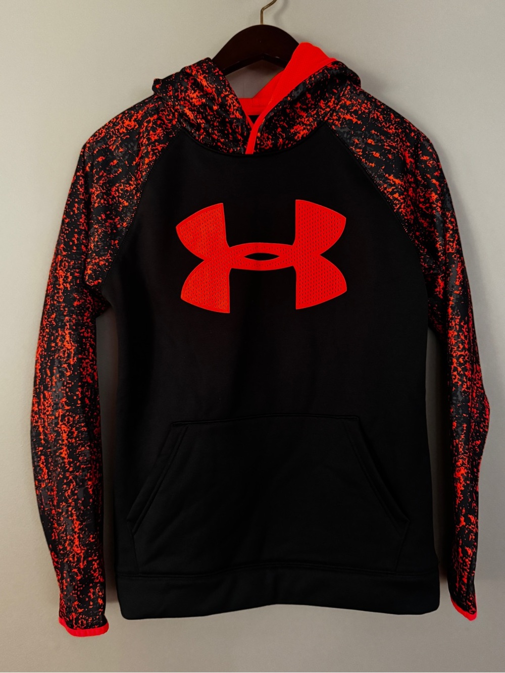 Boys Under Armour Black Hoodie with Bright Orange Logo and Speckled Sleeves L